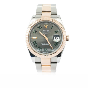 Two-tone watch with silver and rose gold band on a white background