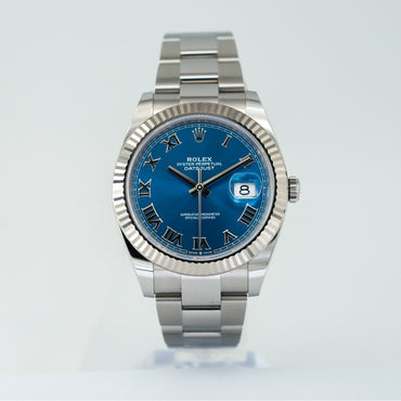 Rolex DateJust 41 126334 Blue Azzurro Dial Oyster Bracelet 2024 Silver Rolex watch with a blue face on a white background