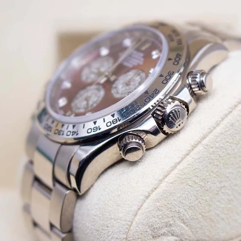 Rolex Daytona 116509 Tahitian Mother of Pearl Dial  Close-up of watch with a detailed face on a light background