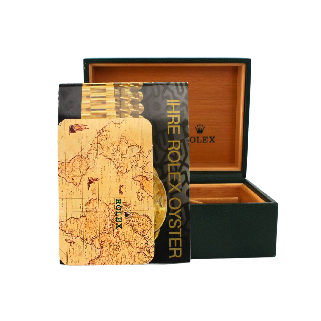 Rolex packaging with world map design and branded box on a white background