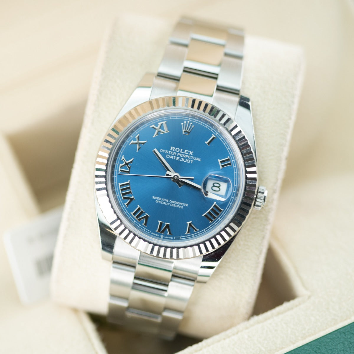 Rolex DateJust 41 126334 Blue Azzurro Dial Oyster Bracelet 2024 Silver Rolex watch with a blue face on a white background