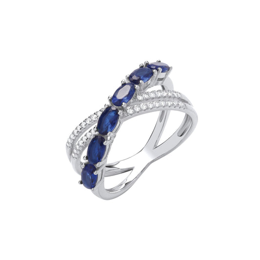 Silver Cross Over Clear & Blue Cubic Zirconias Ring