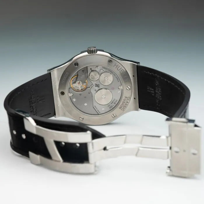 Hublot Classic Fusion Ultra-Thin 515.NX.1270.LR Titanium 45mm Black Dial Luxury watch with black strap and silver case on a light gray background