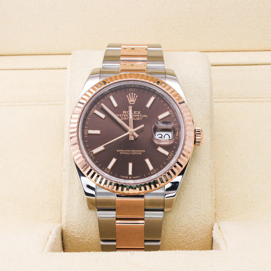 Rolex Datejust 41 126331 Watch – Chocolate Dial Luxury watch with brown dial and rose gold accents on a beige cushion