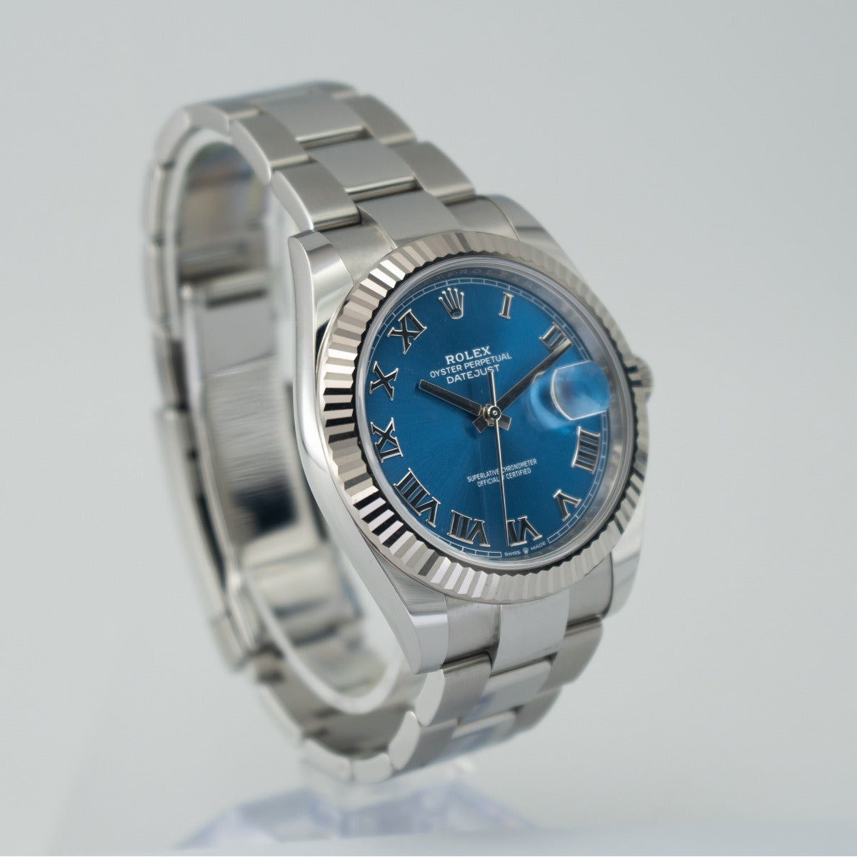 Rolex DateJust 41 126334 Blue Azzurro Dial Oyster Bracelet 2024 Silver Rolex watch with a blue face on a white background